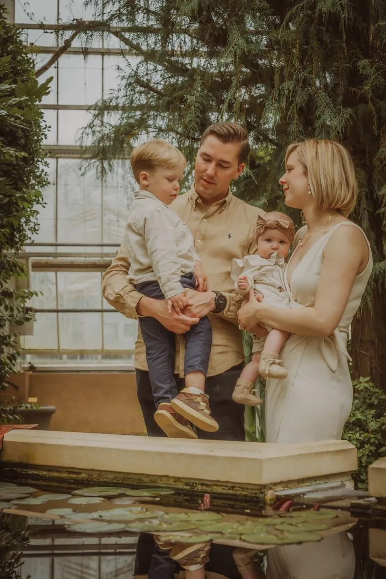 Up close, calm pace Family in a conservatory